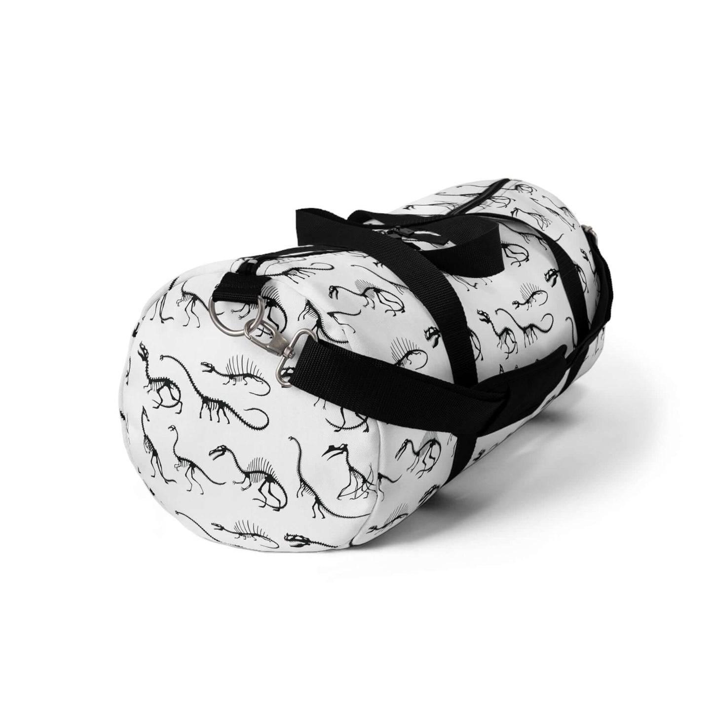 Dinosaur Skeleton Duffel BagUnleash your inner archaeologist with this dino-mite Dinosaur Skeleton Duffel Bag. Perfect for fossil hunts and overnight trips, this bag is made with durable materials and plenty of pockets for all your prehistoric possessions