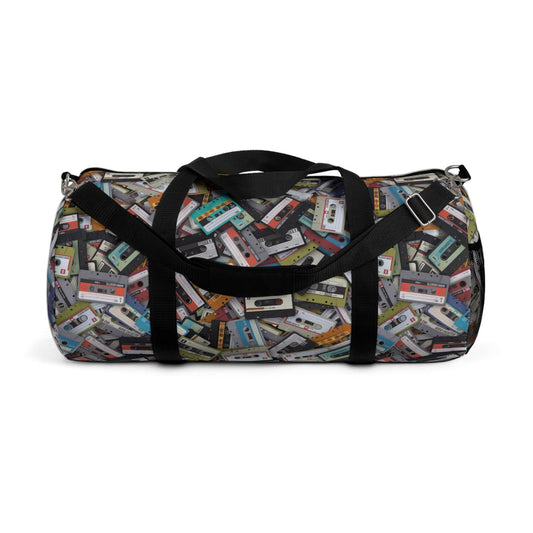 £79.89Cassette Tape Duffel BagRock your retro style with our Cassette Tape Duffel Bag! Perfect for music lovers, this bag is made from recycled cassette tapes. With a spacious interior and sturdy straps, it's great for carrying all your essentials (and ma