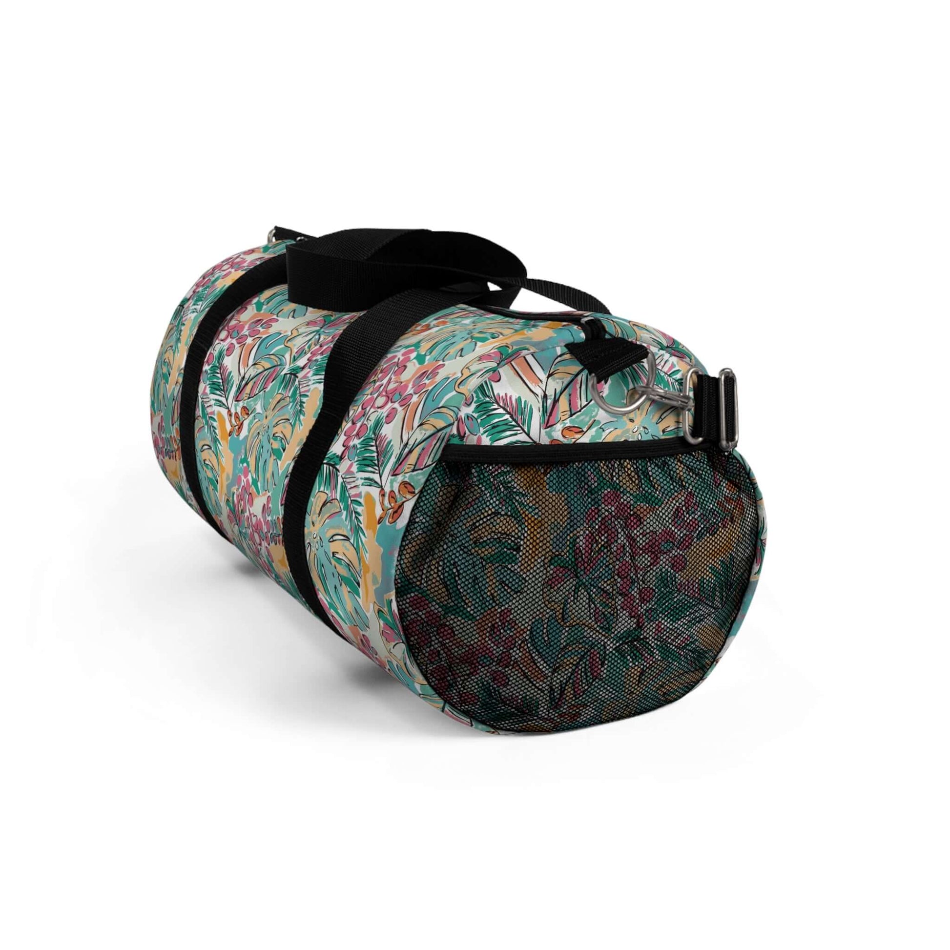 Vibrant Flowers Duffel BagIndulge in luxurious travel with our Vibrant Flowers Duffel Bag. Adorned with a striking floral design, this duffel bag is not only visually stunning but also highly functional. Its spacious interior allows for easy organization