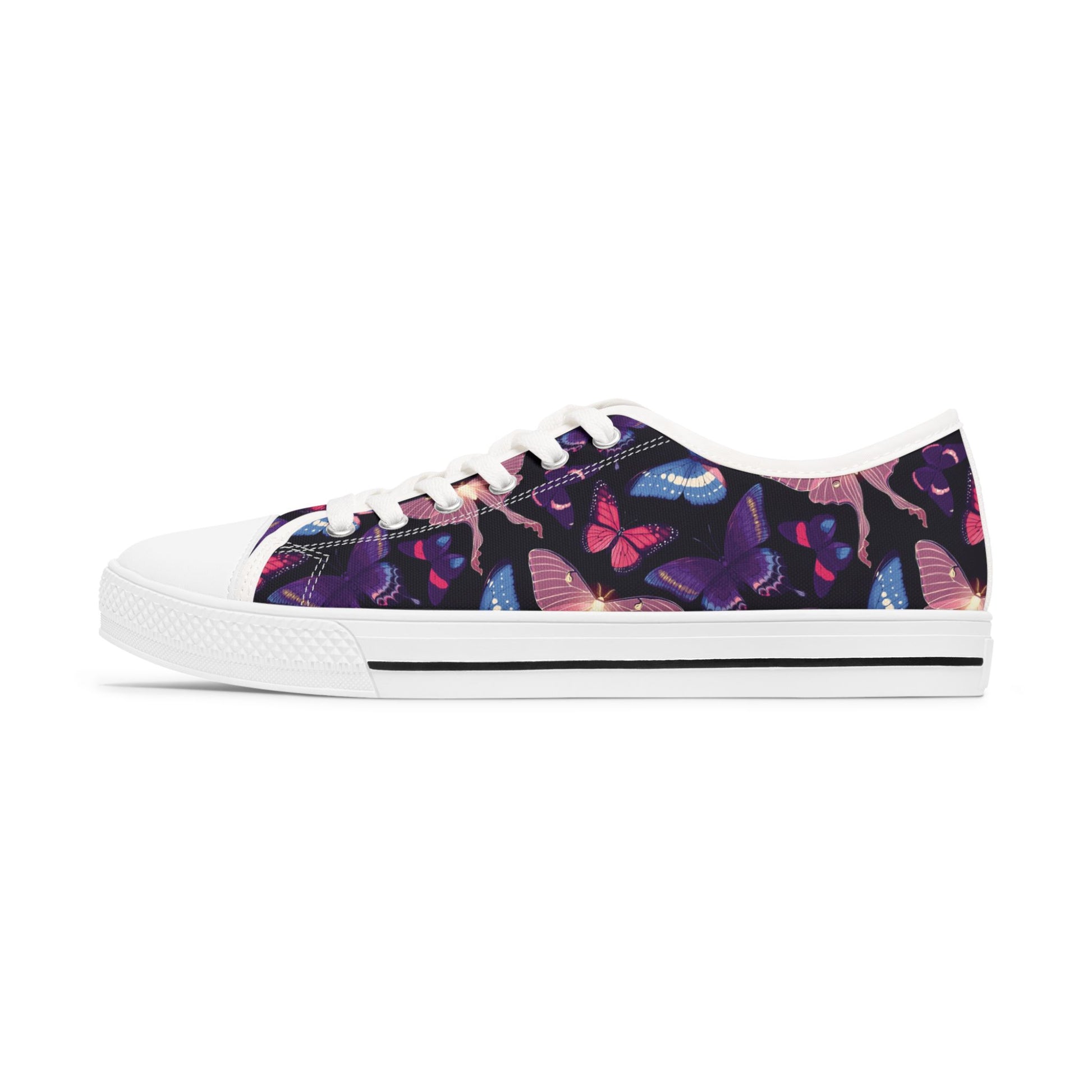 Women's Vivid Butterfly Low Top SneakersElevate your style with our Women's Vivid Butterfly Low Top Sneakers. These eye-catching sneakers feature a delicate butterfly design, adding a touch of elegance to any outfit. With their low top design and comforta