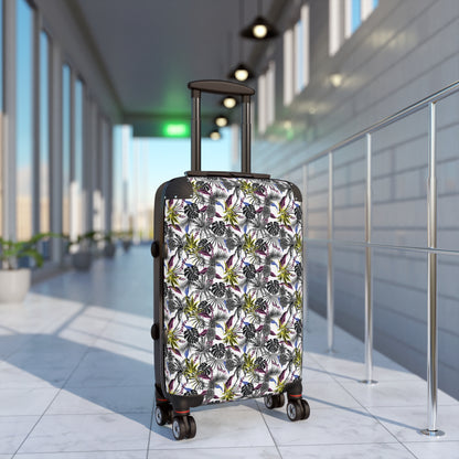 £235.54Tropical Forest SuitcaseIntroducing the Tropical Forest Suitcase - a masterpiece of luxury travel. With its vibrant and exotic design, this suitcase will surely turn heads as you jet set around the world. Made with premium materials for durability