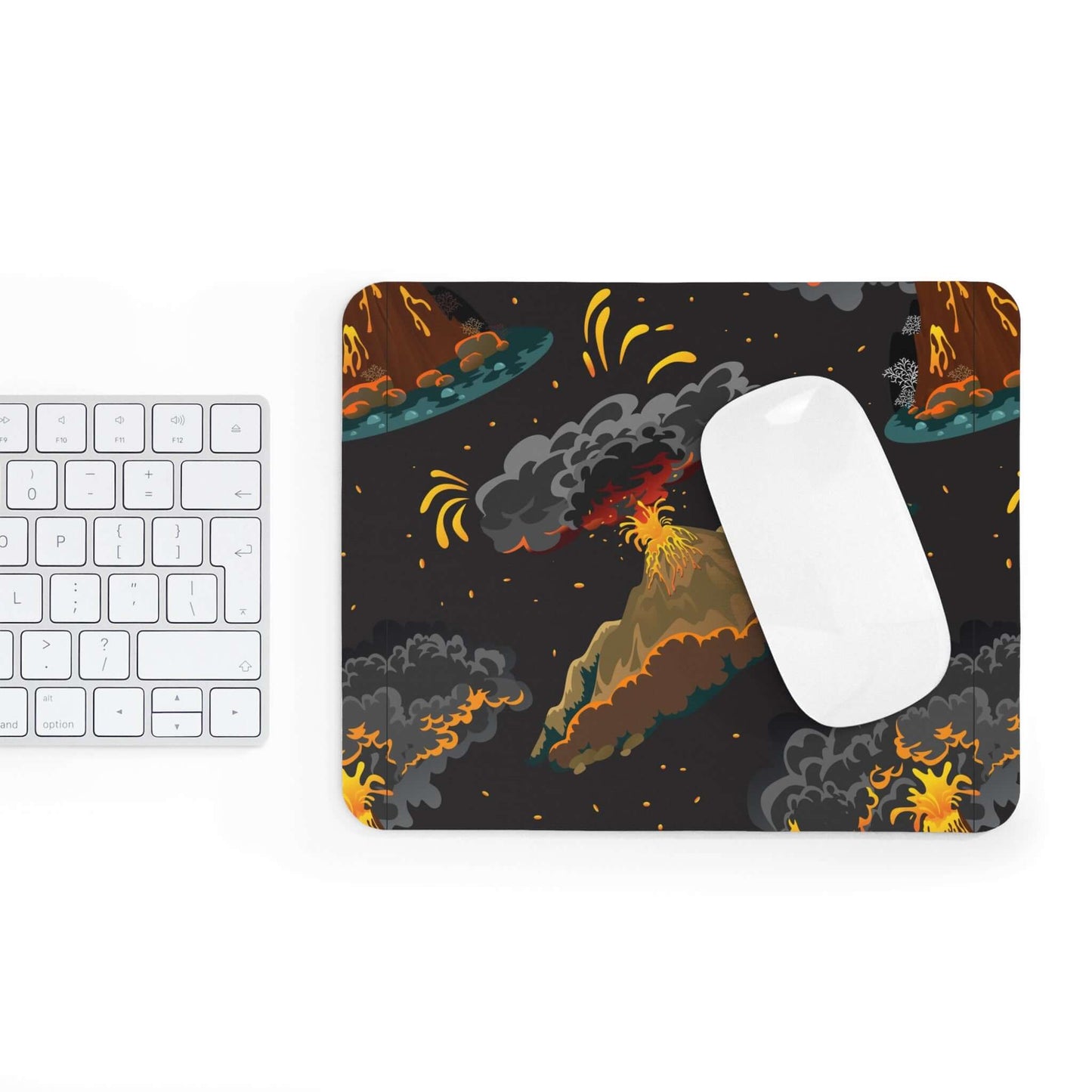 Volcanoes Mouse PadGet ready to erupt with productivity with our Volcanoes Mouse Pad! This unique and playful mouse pad features a vivid description of a fiery volcanic explosion, bringing life and excitement to your desk. Say goodbye to boring work days