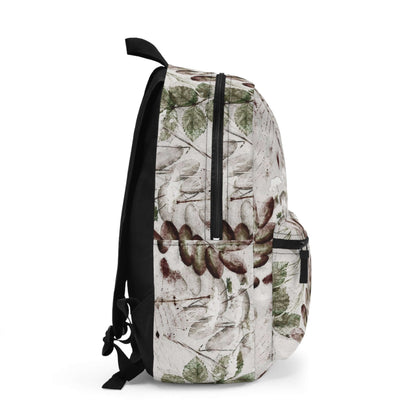 Winter Leaves BackpackStay organized and stylish this winter with our Winter Leaves Backpack. Featuring durable material and a spacious main compartment, this backpack is perfect for everyday use. With a unique leaf design, you'll stand out while staying