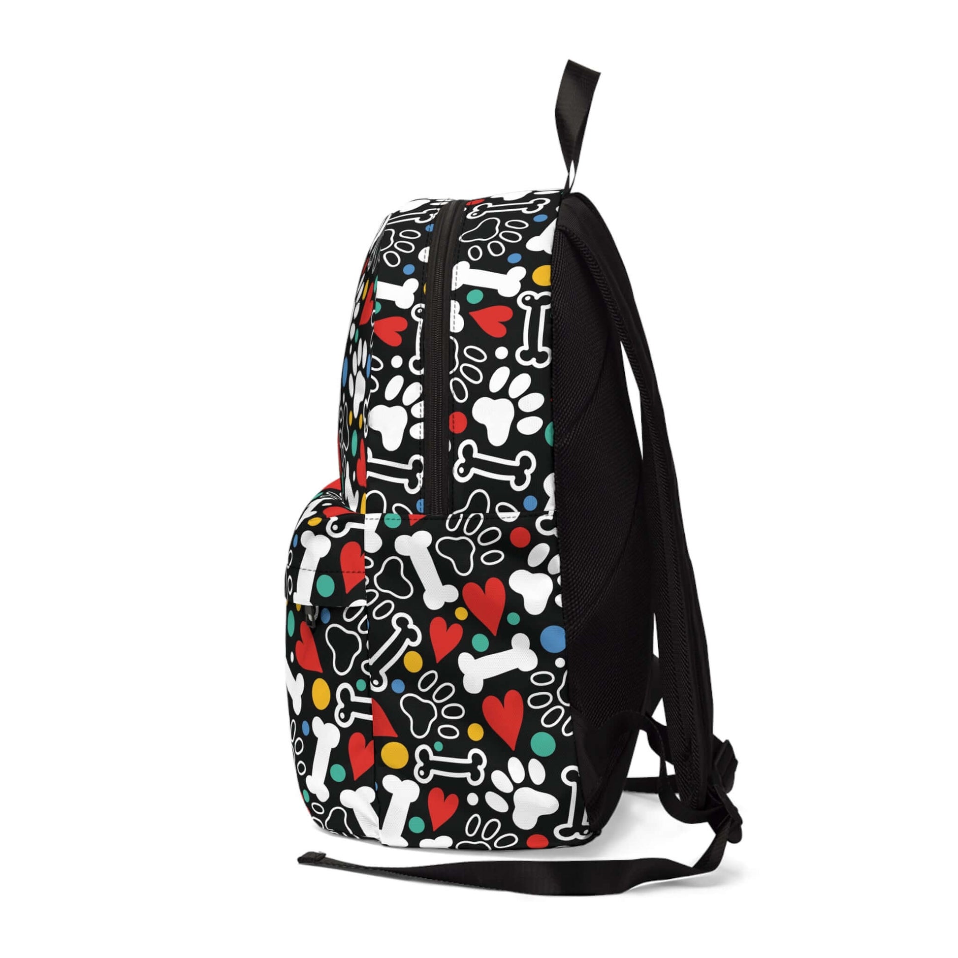 Paw & Bones BackpackThe Paw & Bones Backpack boasts a spacious design with comfortable shoulder straps, perfect for carrying all of your essentials on-the-go. The durable material and reinforced stitching ensure long-lasting use. With a playful paw and bo