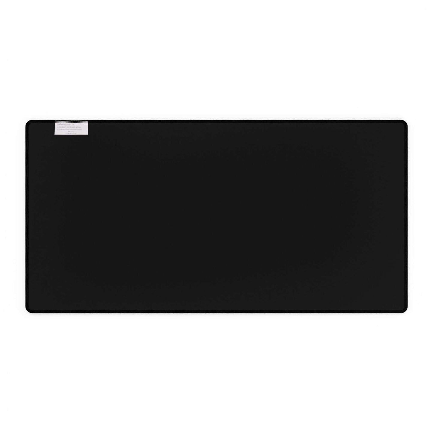 Cassette Tapes Desk Mat with eco-friendly durable material, black surface, smooth texture, non-slip base for mouse support.