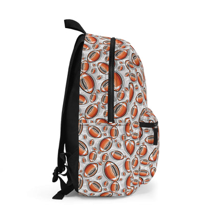 Rugby Balls BackpackScore a try with our Rugby Balls Backpack! This backpack features a playful design of rugby balls that is sure to make a statement. With plenty of space and comfortable straps, this backpack is perfect for a day on the field or a fun w