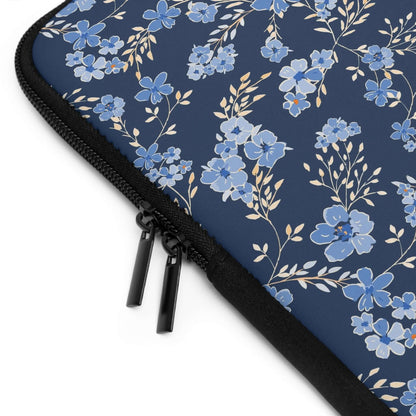 Wildflowers Laptop SleeveThe Wildflowers Laptop Sleeve provides reliable protection for your laptop while showcasing a beautiful wildflower pattern. With a durable construction and soft interior lining, your laptop stays safe and secure while on the go. T