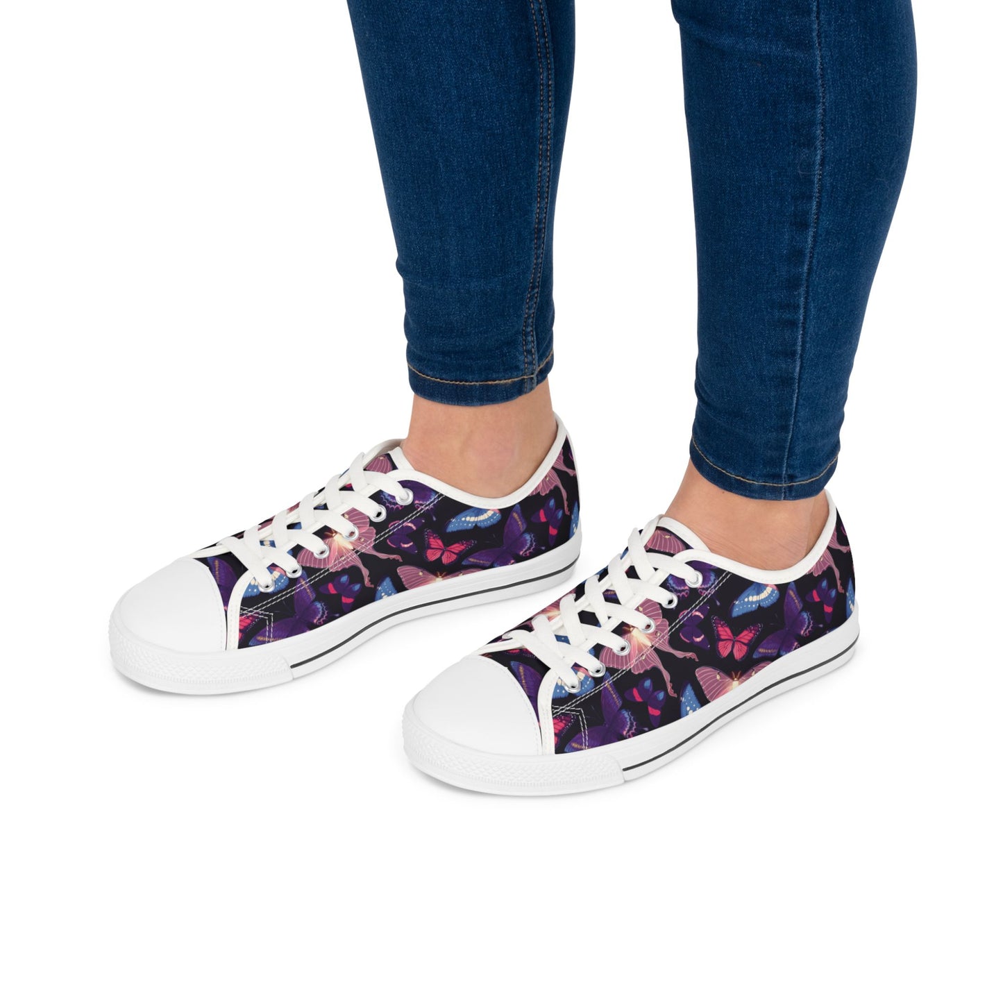 Women's Vivid Butterfly Low Top SneakersElevate your style with our Women's Vivid Butterfly Low Top Sneakers. These eye-catching sneakers feature a delicate butterfly design, adding a touch of elegance to any outfit. With their low top design and comforta