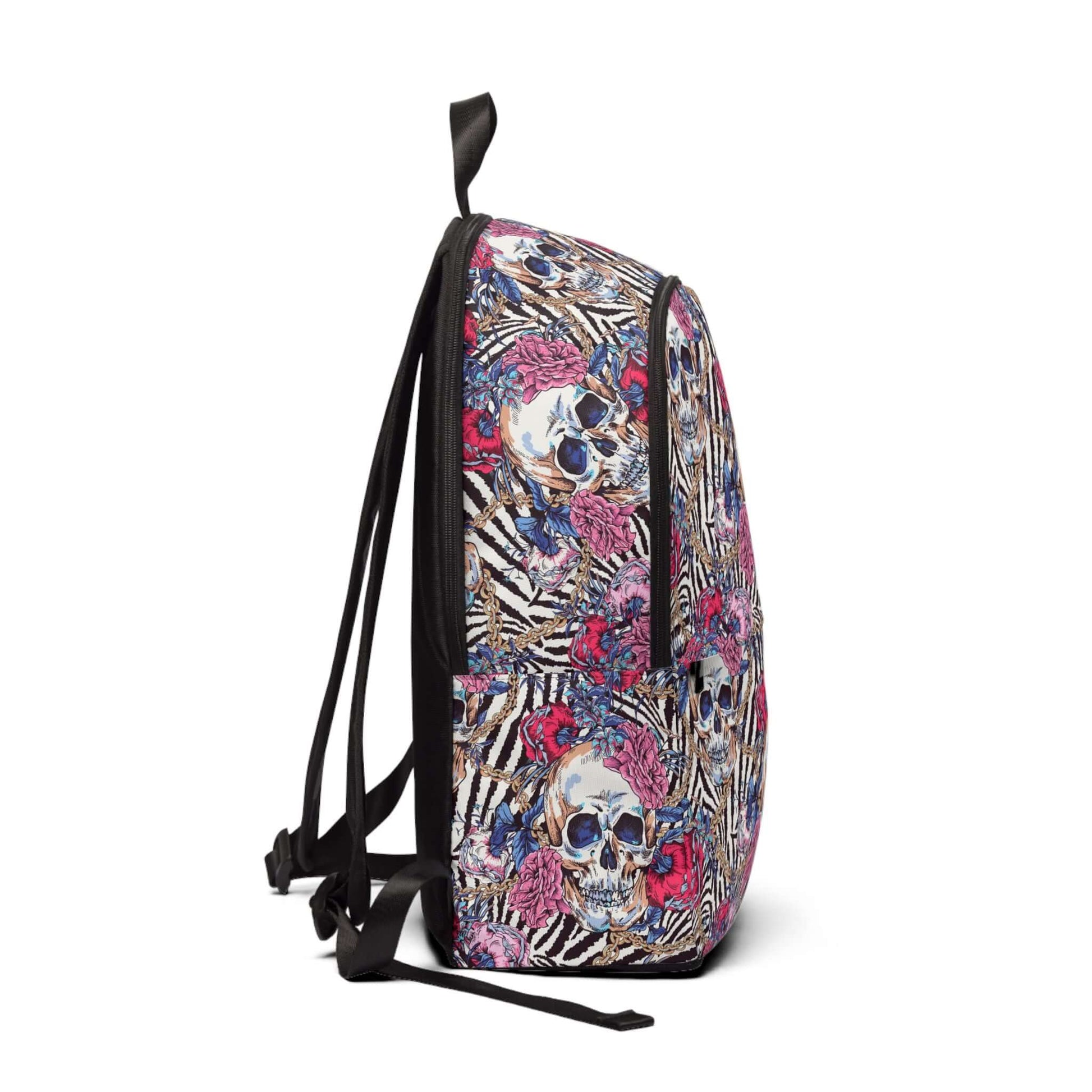 Skulls & Chains BackpackUnleash your inner rebel with our Skulls & Chains Backpack! Featuring a striking design of skulls and chains, this backpack is perfect for those who refuse to conform. With its spacious compartments and sturdy straps, it's both sty