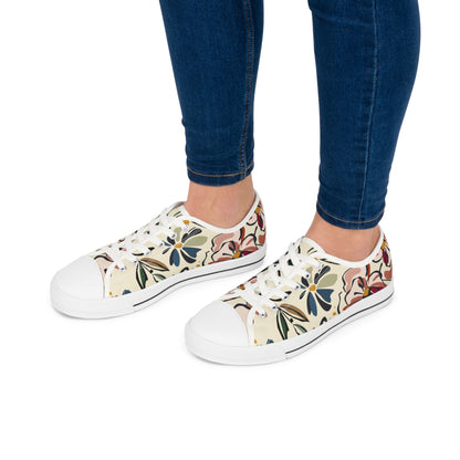 Women's Abstract Flowers Low Top SneakersIntroducing our Women's Abstract Flowers Low Top Sneakers, a stunning blend of art and fashion. These luxurious shoes feature an exclusive abstract floral design, making them a unique addition to any wardrobe. With